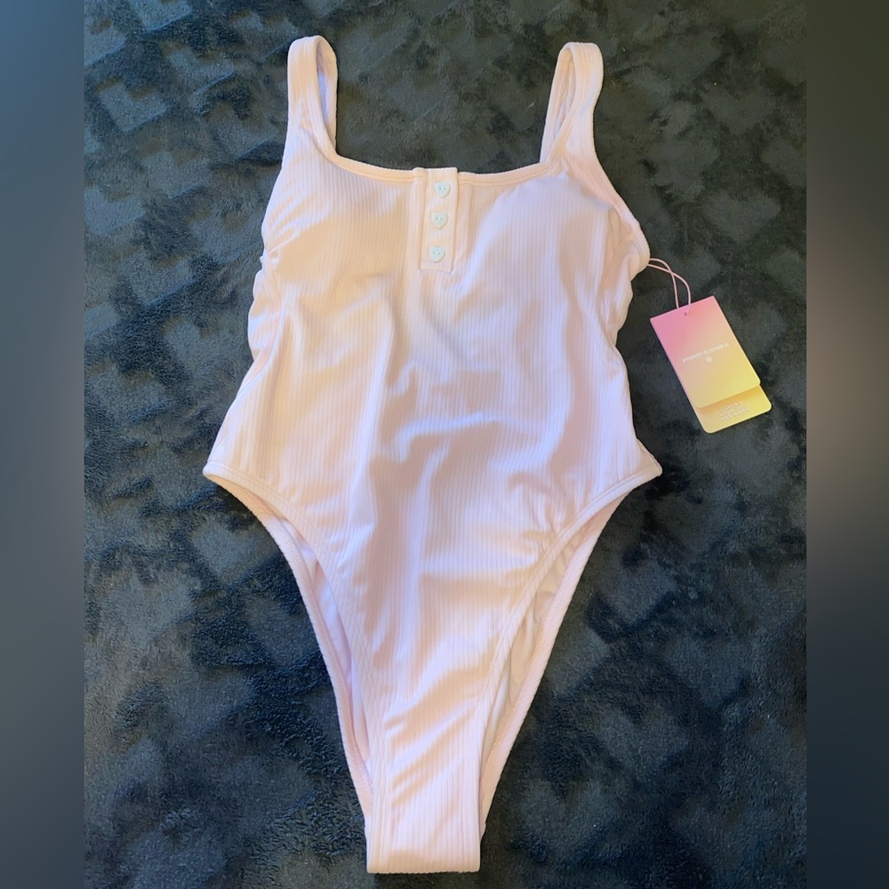 NWT: Never worn. Stoney clover one piece.